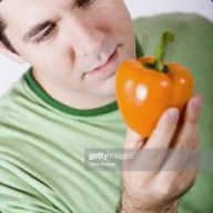 Man Eating a Bell Pepper