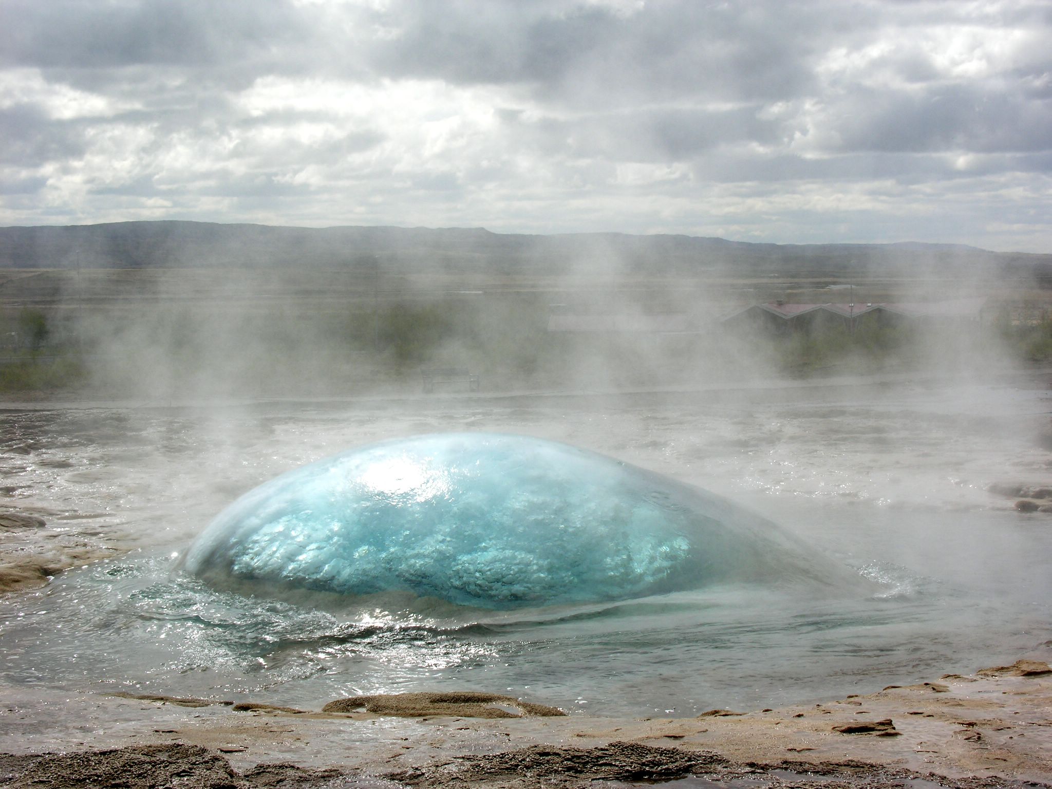 Strokkur_Geyser,_Iceland,_beginning_to_erupt.jpg